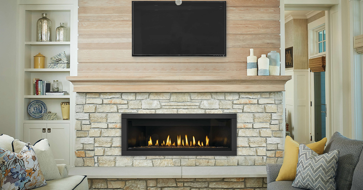 Napoleon gas fireplace with stone surround